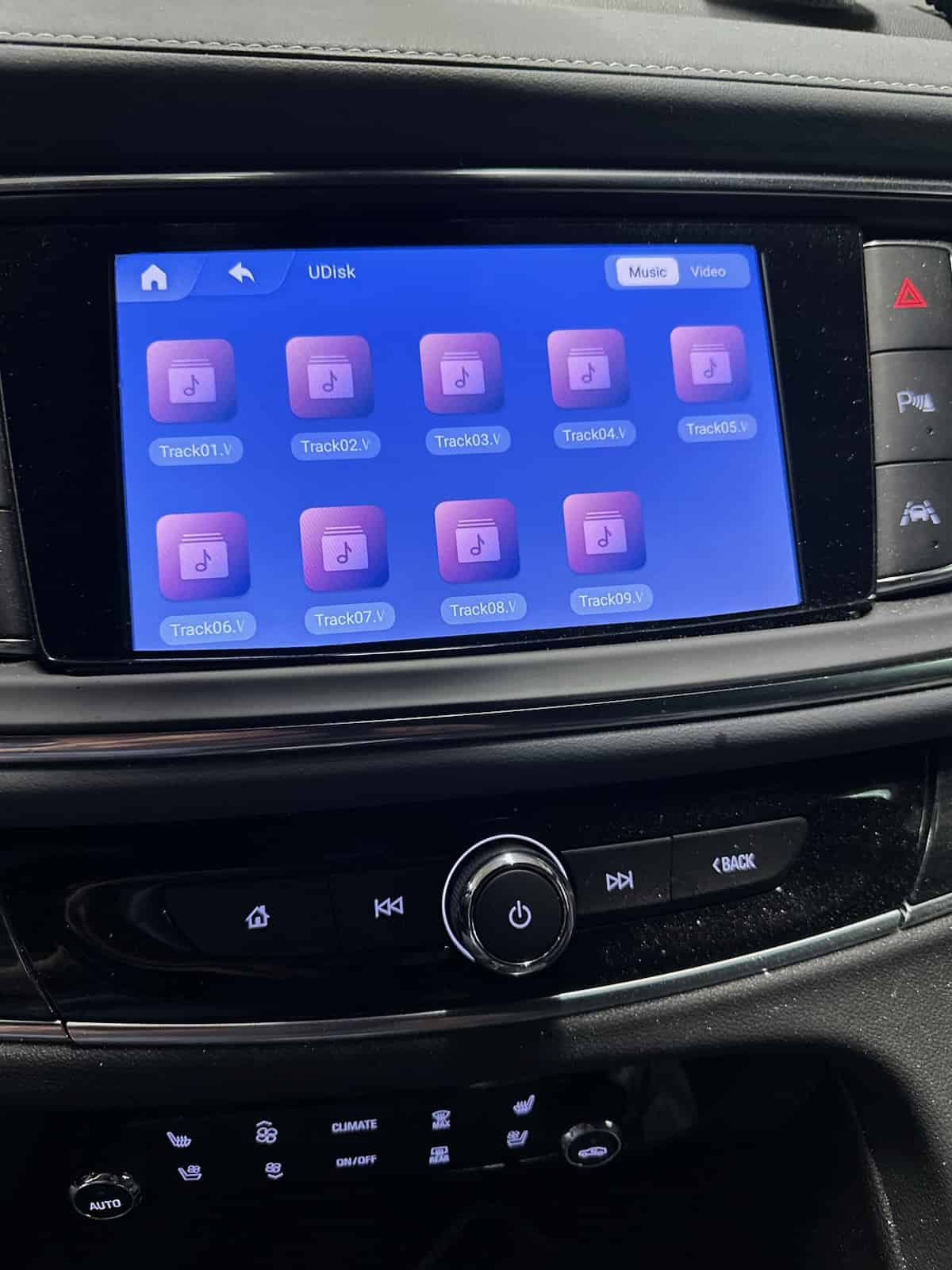 How do I play CD in my car with no CD player?